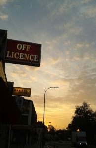Not yet open for business: Off Licence and Western Union at sunrise